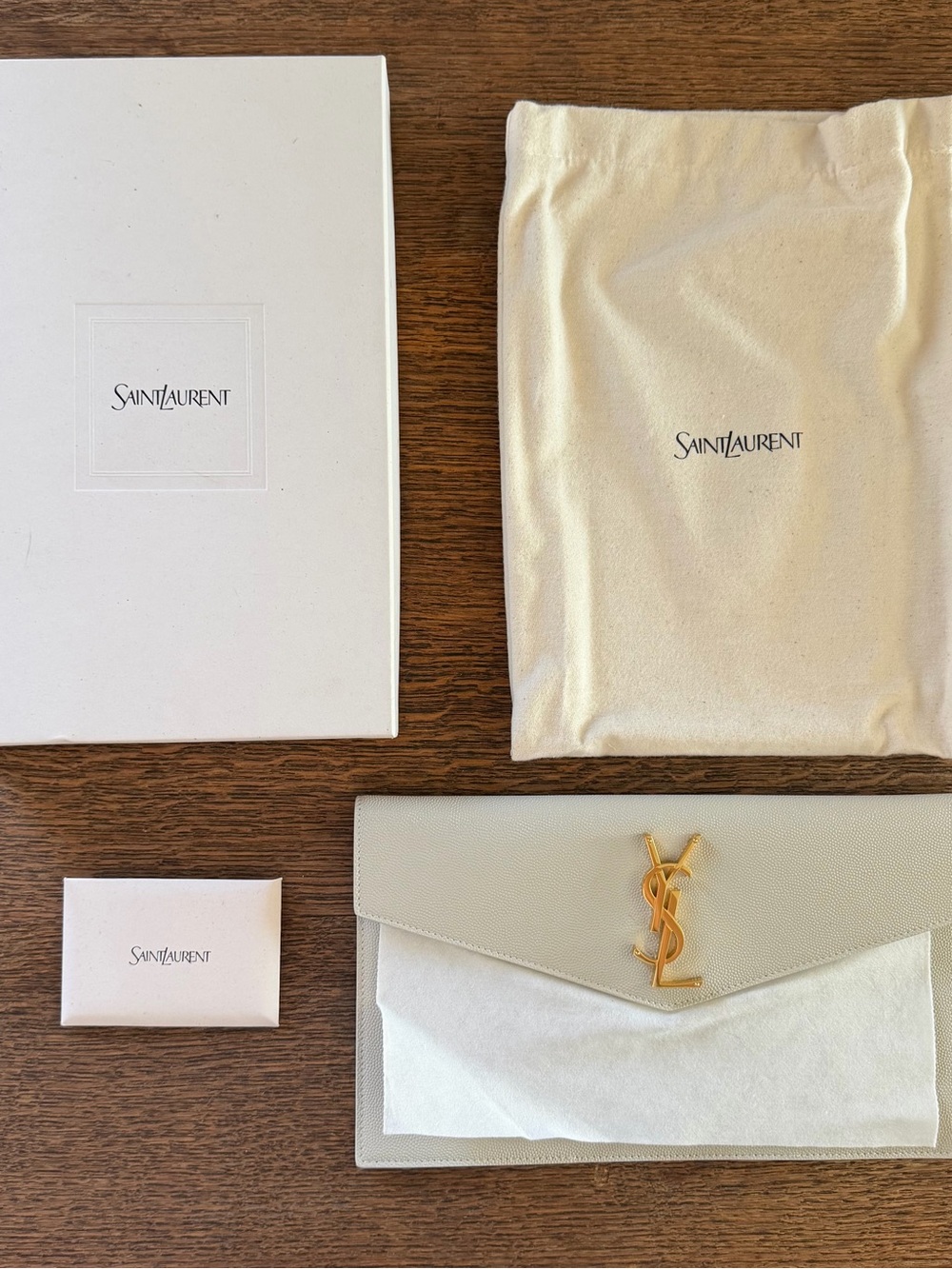 Saint Laurent Cream Leather Envelope Clutch with Gold YSL Logo